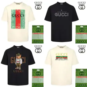 Gucci Graphic Print T-Shirts