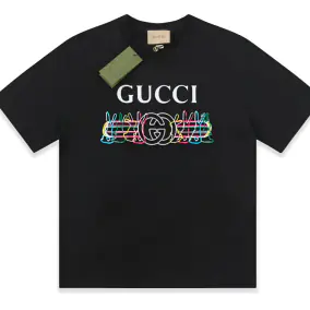 Cream T-Shirt with Gold Print and Red Lettering