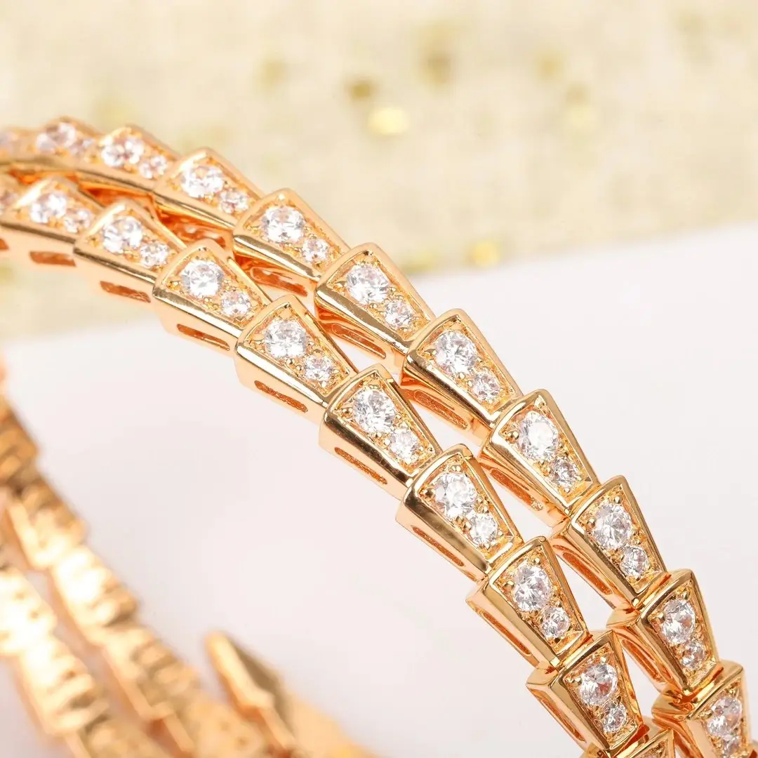 Gold-tone snake motif bracelet set photo 11