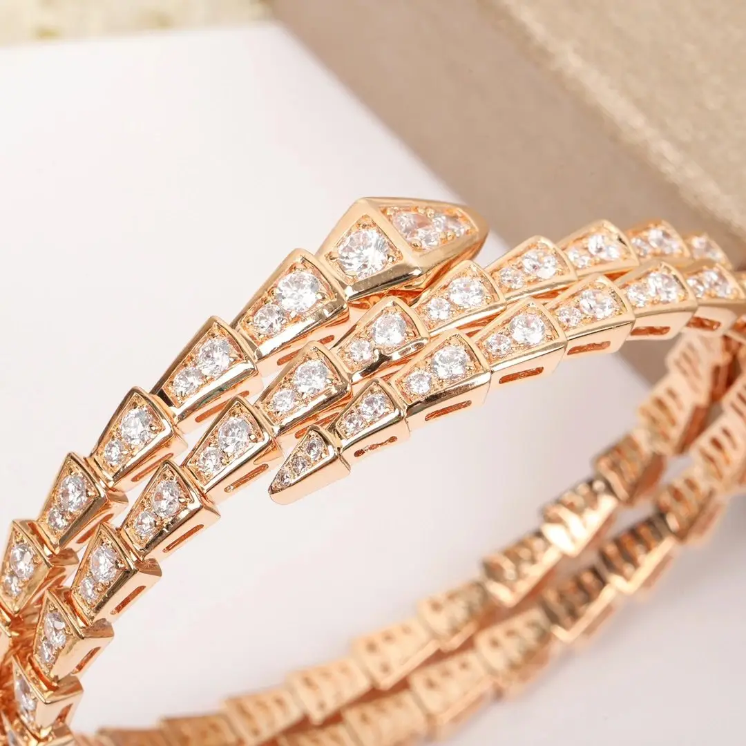 Gold-tone snake motif bracelet set photo 12