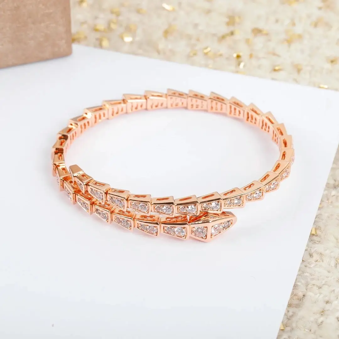 Gold-tone snake motif bracelet set photo 2