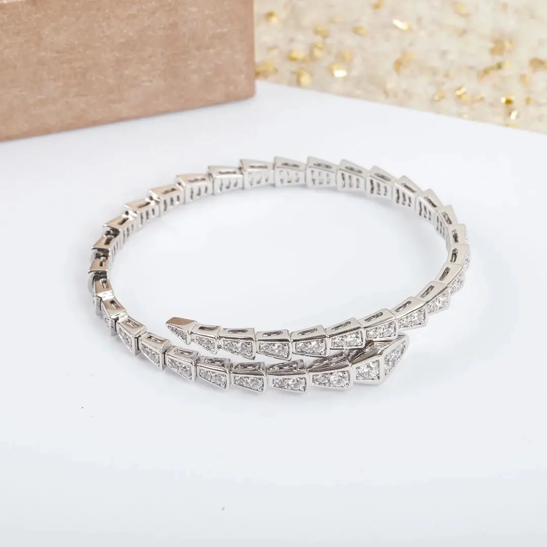 Gold-tone snake motif bracelet set photo 3