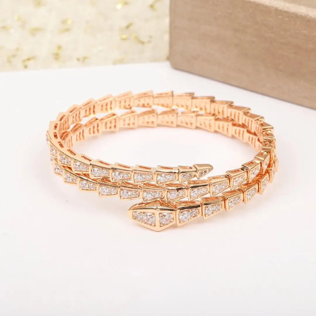 Gold-tone snake motif bracelet set photo 9