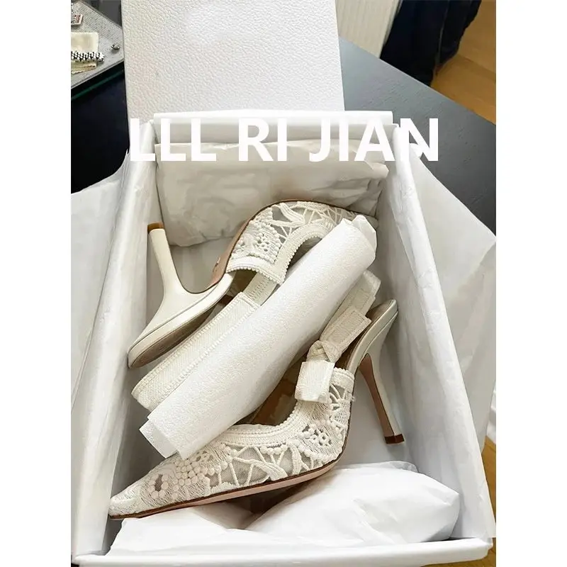 Elegant white stiletto heels heel detail