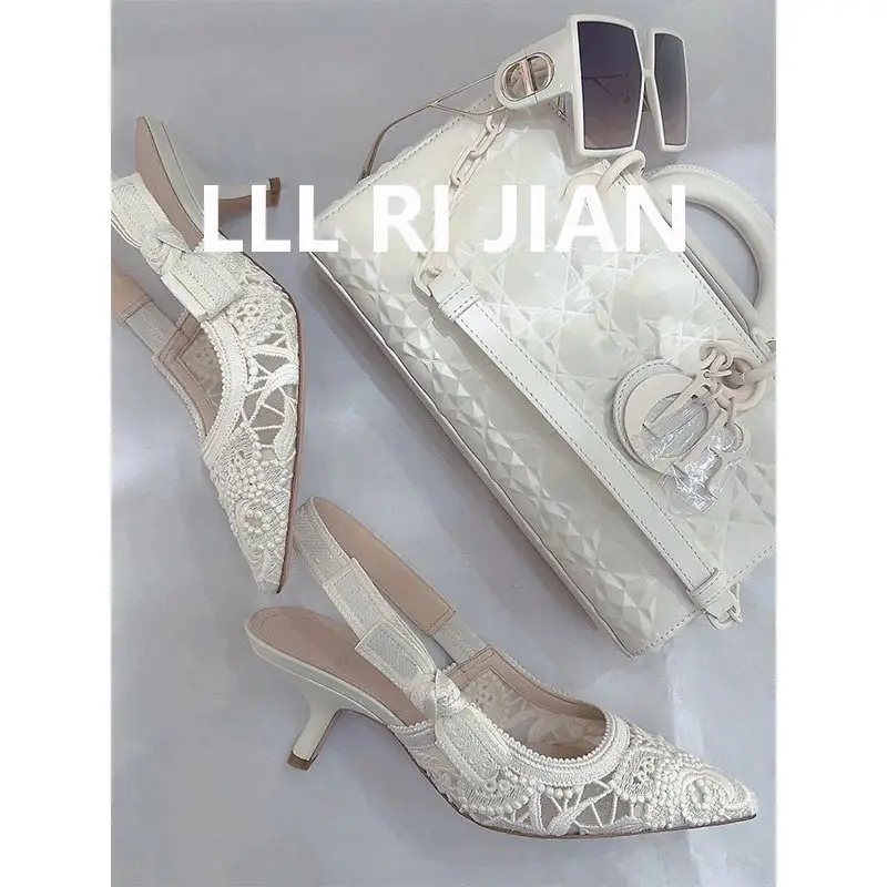 Elegant white stiletto heels top view