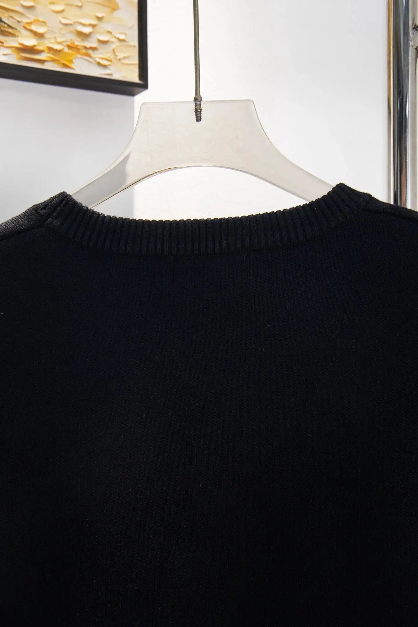 Black sweater fabric close-up