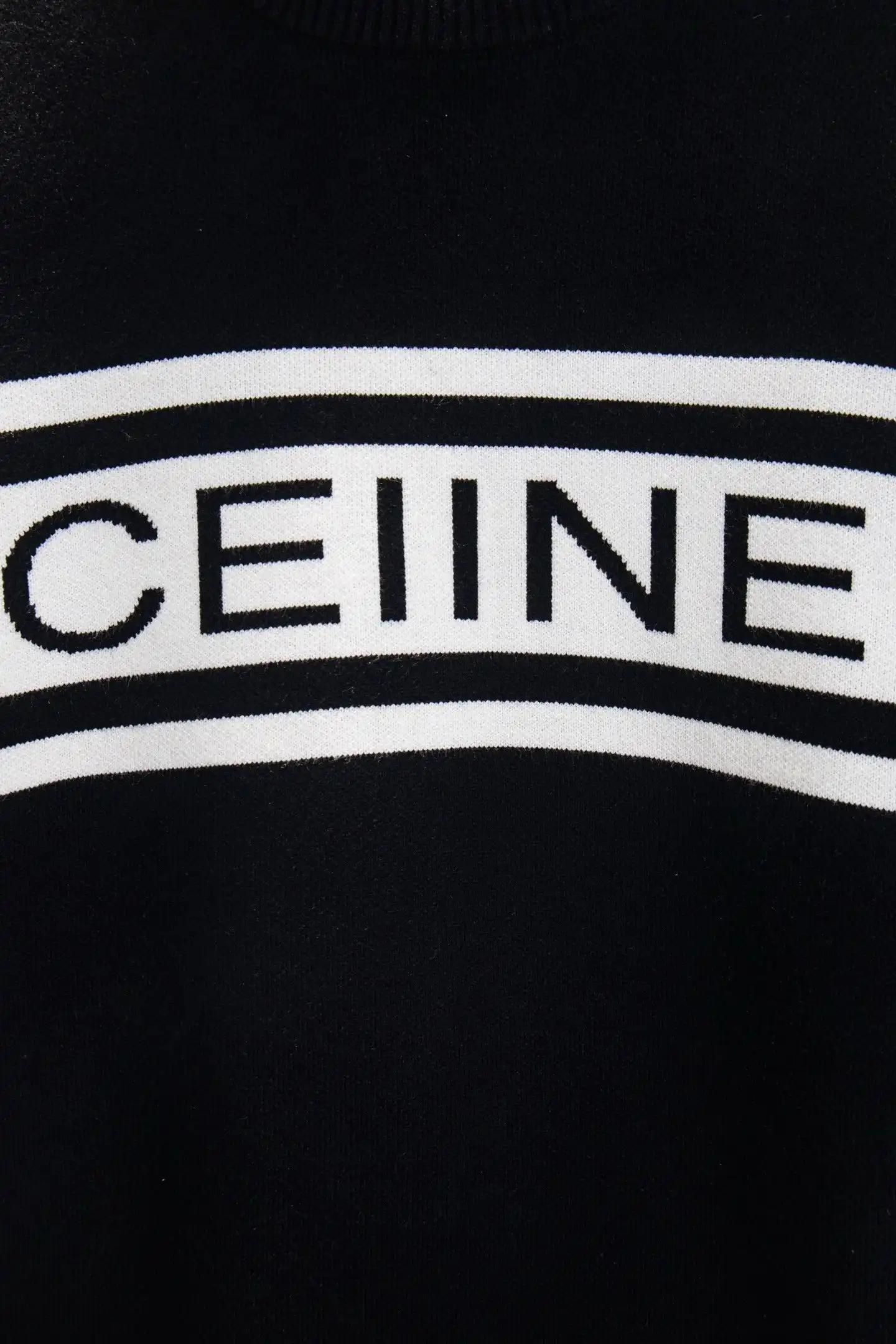 Black sweater sleeve detail