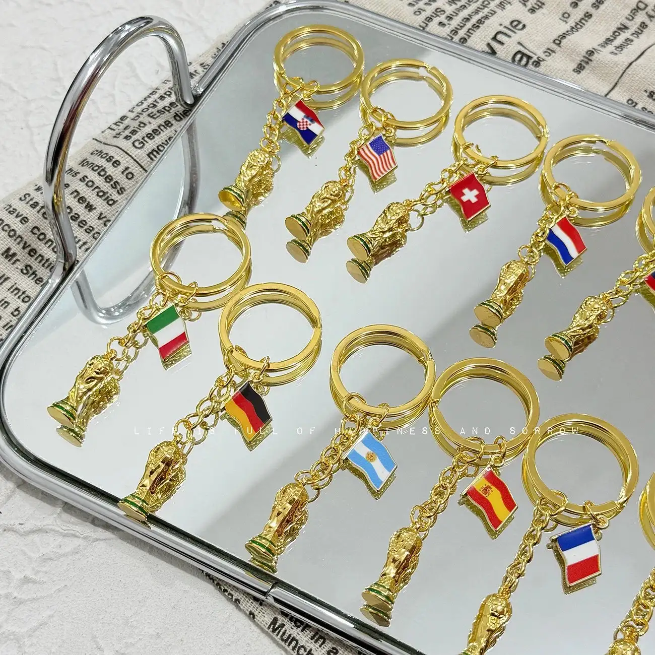 World Cup flag keychain side view